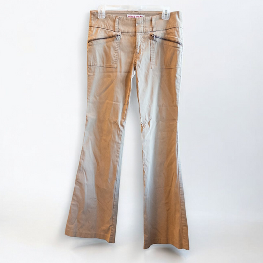 Guess vintage Y2K khaki flare pants with zippered pockets and relaxed fit hanging on a hanger