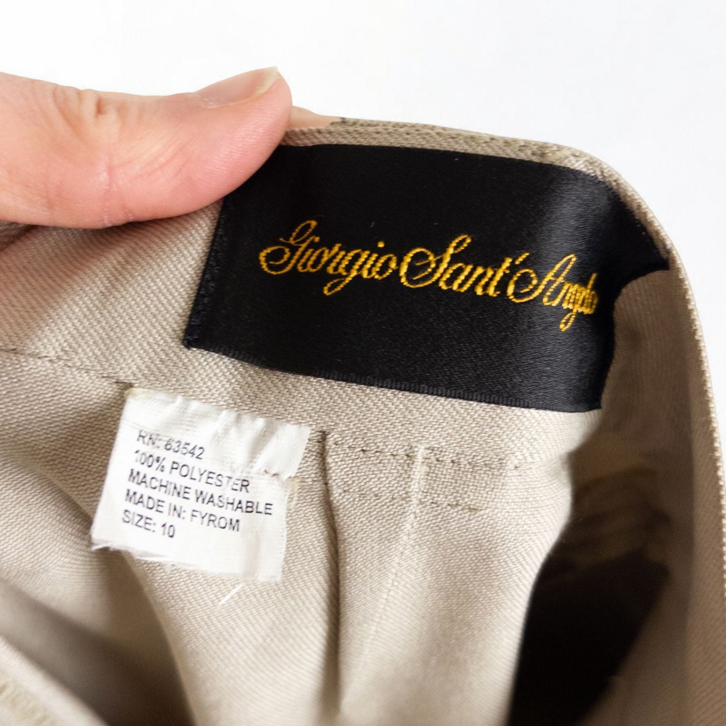 Giorgio Sant Angelo tan vintage pants with front pleats and dual button closure hanging on hanger image 10