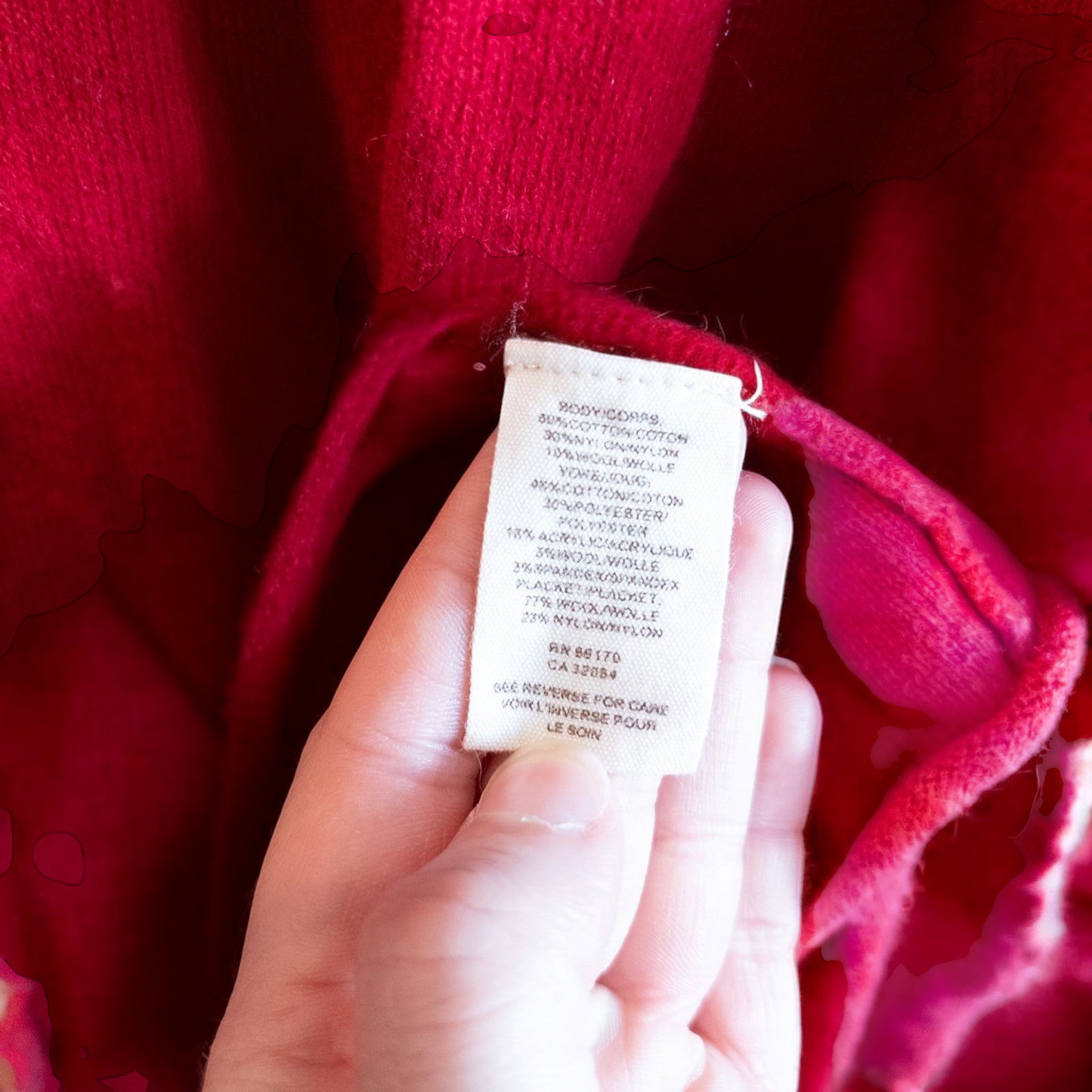 Free People red wool knit cardigan sweater with hood and button front, hung on white hanger image 10