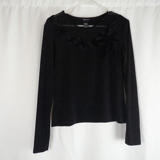 Beliza black velvet womens medium top with long sleeves and decorative velvet ribbon and bead trim at neckline on white hanger