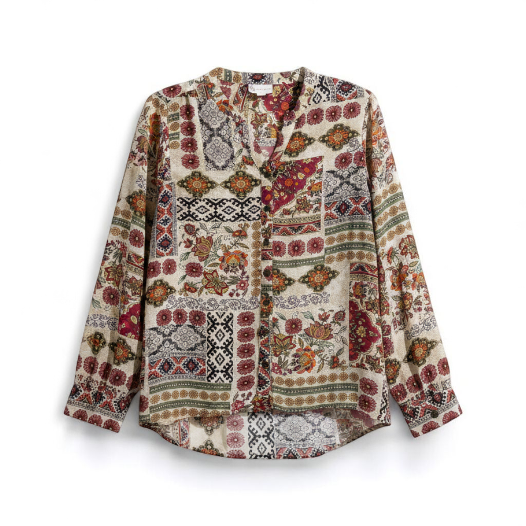 Vintage womens multicolor floral patchwork print blouse with button front and long sleeves front on white muslin photography backdrop