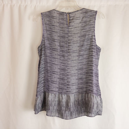 Elle black and white striped sleeveless tank top with peplum hem on clear hanger image 4