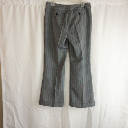 Tracy Evans vintage black plaid check women's pants size 11 displayed front and back with side zipper closure and cuffed hems. image 7