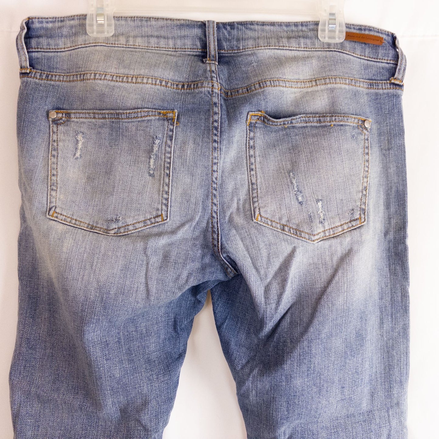 Pilcro and the Letterpress Hyphen women's blue distressed denim jeans size 30 laid flat showing front, pockets, distressing and back views image 9