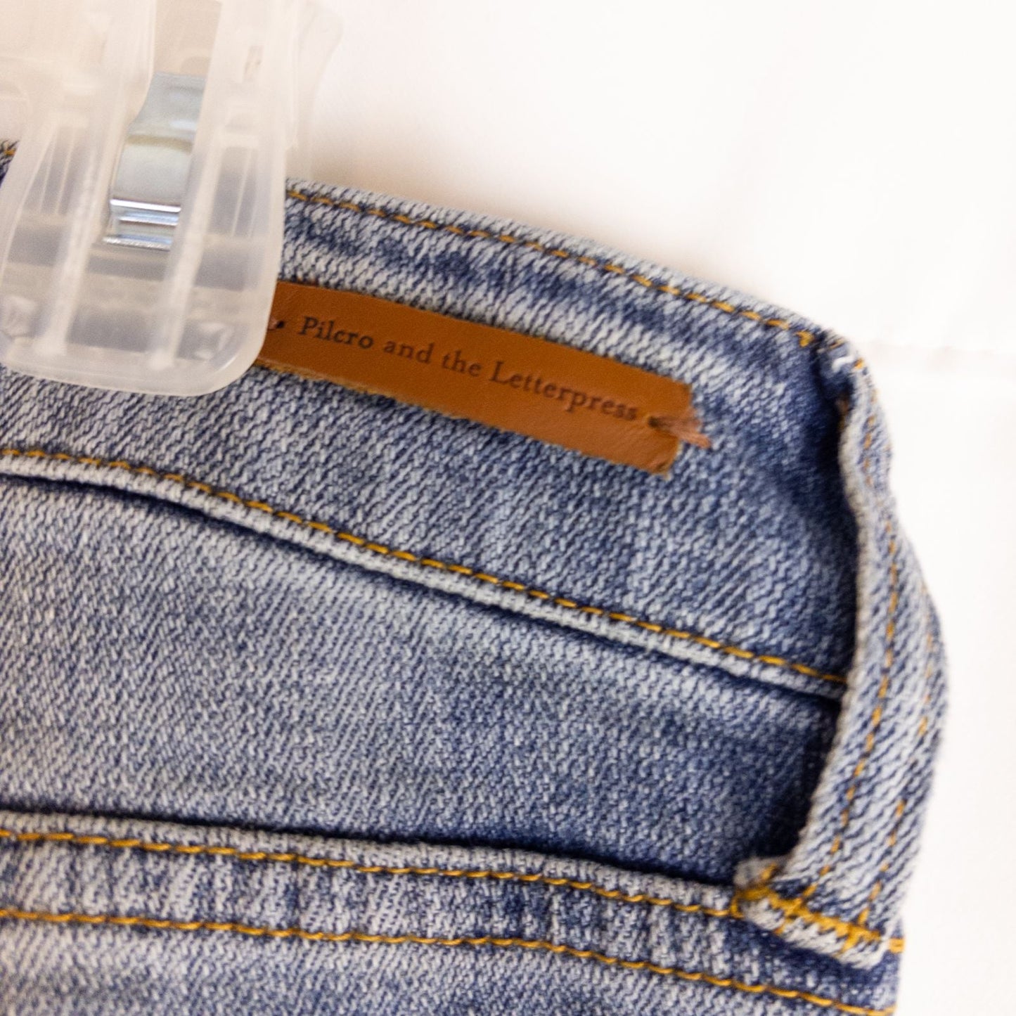 Pilcro and the Letterpress Hyphen women's blue distressed denim jeans size 30 laid flat showing front, pockets, distressing and back views image 10