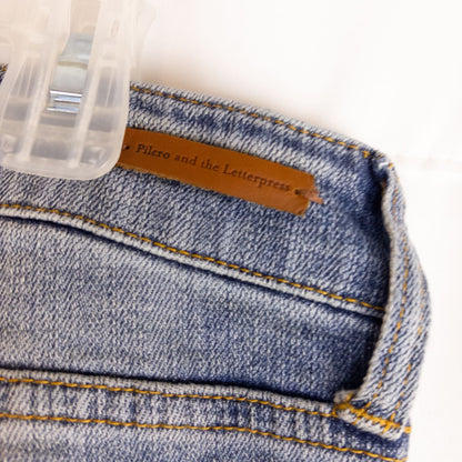 Pilcro and the Letterpress Hyphen women's blue distressed denim jeans size 30 laid flat showing front, pockets, distressing and back views image 10