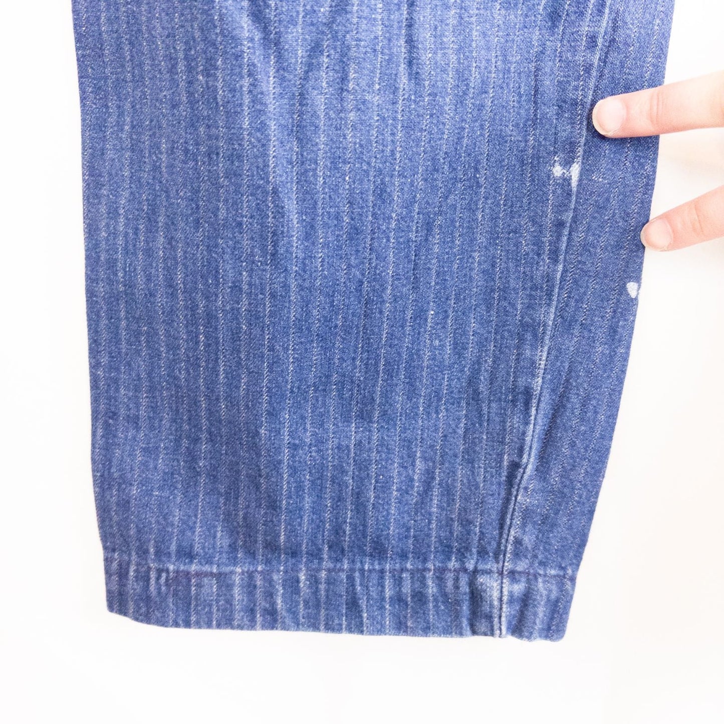 Wilkins rumble seat vintage blue striped jeans womens size 28 hanging on wood hanger in front of white background image 12