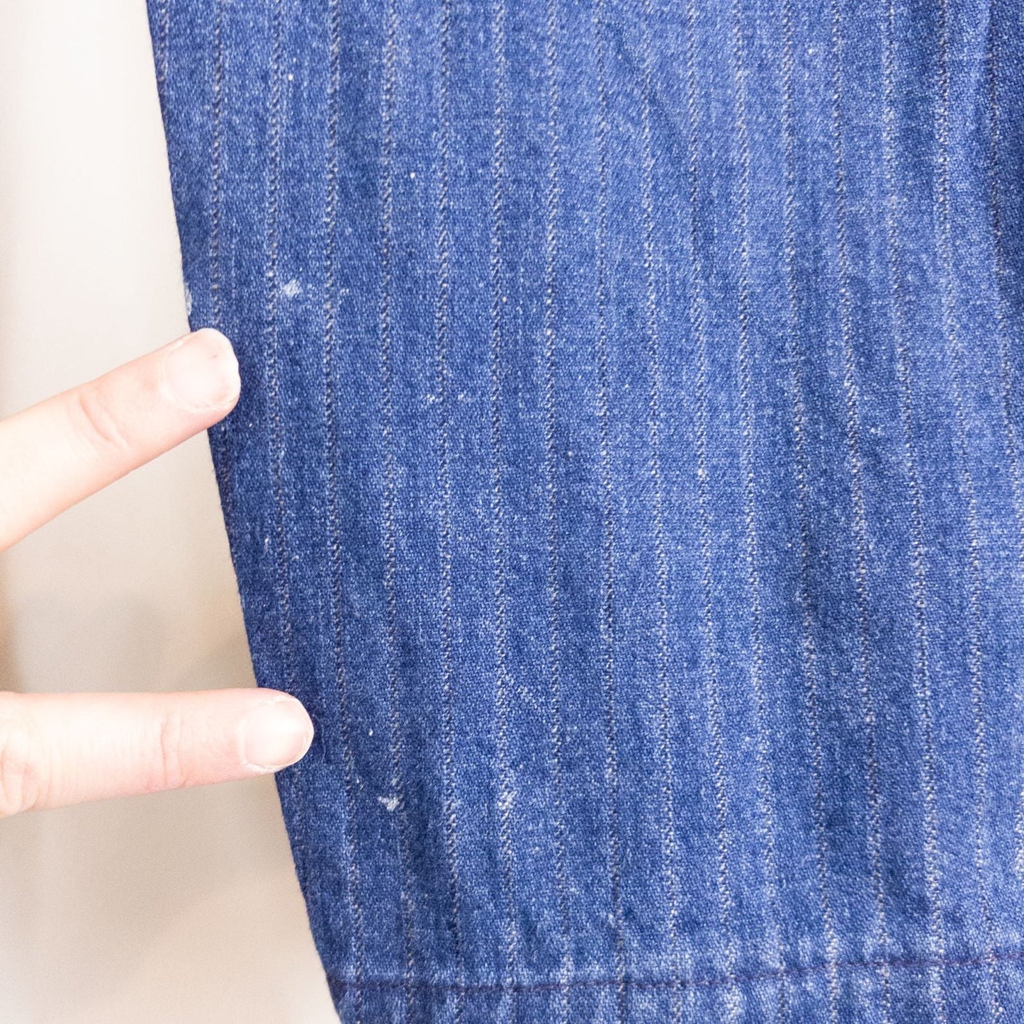 Wilkins rumble seat vintage blue striped jeans womens size 28 hanging on wood hanger in front of white background image 6