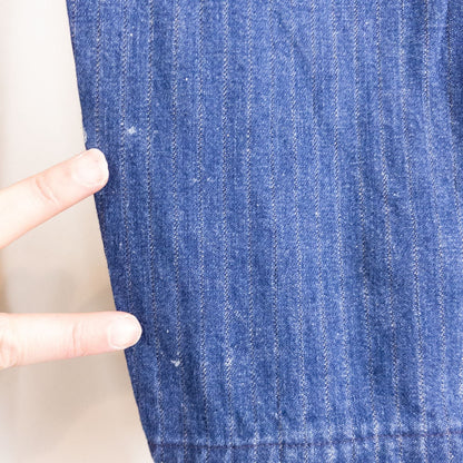 Wilkins rumble seat vintage blue striped jeans womens size 28 hanging on wood hanger in front of white background image 6