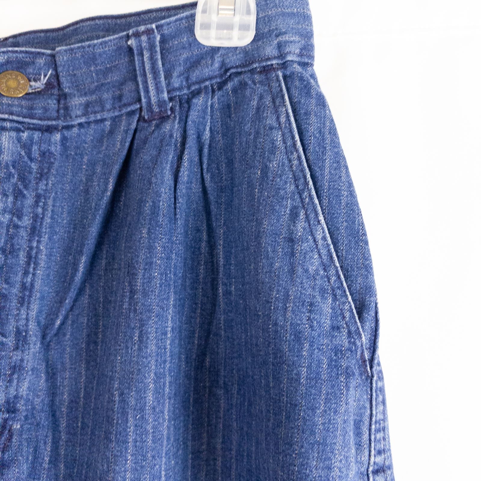 Wilkins rumble seat vintage blue striped jeans womens size 28 hanging on wood hanger in front of white background image 5