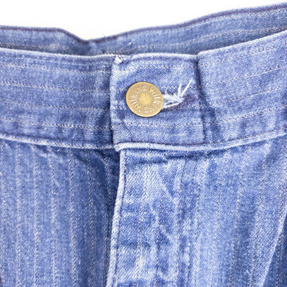 Wilkins rumble seat vintage blue striped jeans womens size 28 hanging on wood hanger in front of white background image 4