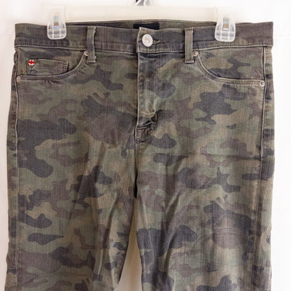 Hudson green camo skinny jeans womens size 31 with minimal wear and faux front pockets displayed hanging. image 2
