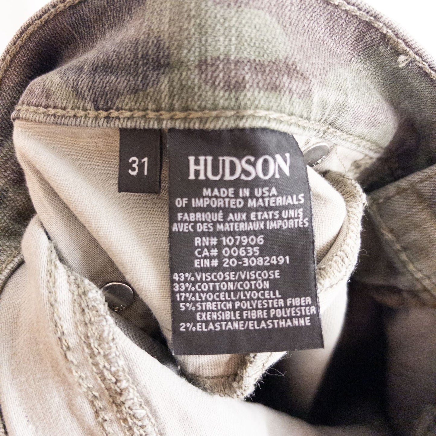 Hudson green camo skinny jeans womens size 31 with minimal wear and faux front pockets displayed hanging. image 9
