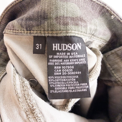 Hudson green camo skinny jeans womens size 31 with minimal wear and faux front pockets displayed hanging. image 9