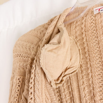 Talbots tan vintage cable knit cardigan sweater with button front and shoulder pads hanging on clear hanger image 5