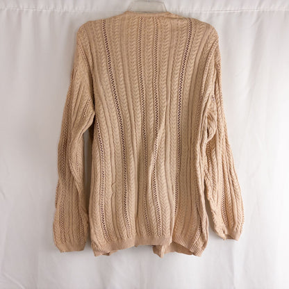 Talbots tan vintage cable knit cardigan sweater with button front and shoulder pads hanging on clear hanger image 6