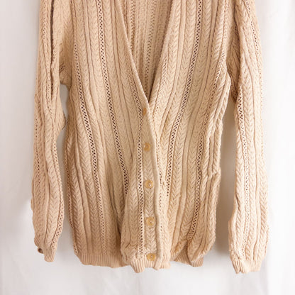 Talbots tan vintage cable knit cardigan sweater with button front and shoulder pads hanging on clear hanger image 3