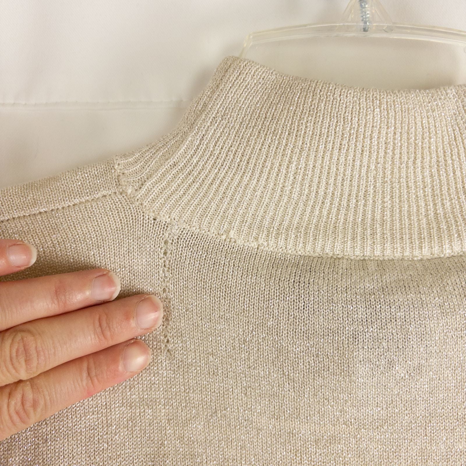 Silver knit long sleeve August Silk sweater with mock neckline laid flat showing subtle shimmer and texture image 7