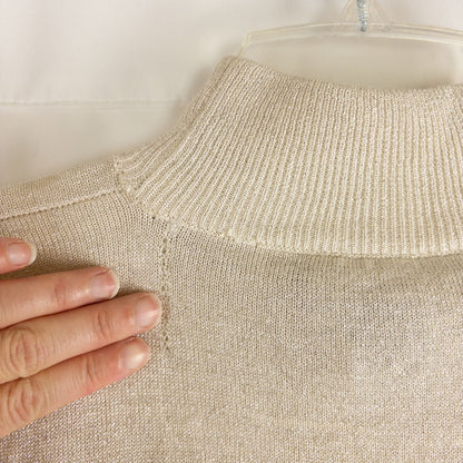 Silver knit long sleeve August Silk sweater with mock neckline laid flat showing subtle shimmer and texture image 7