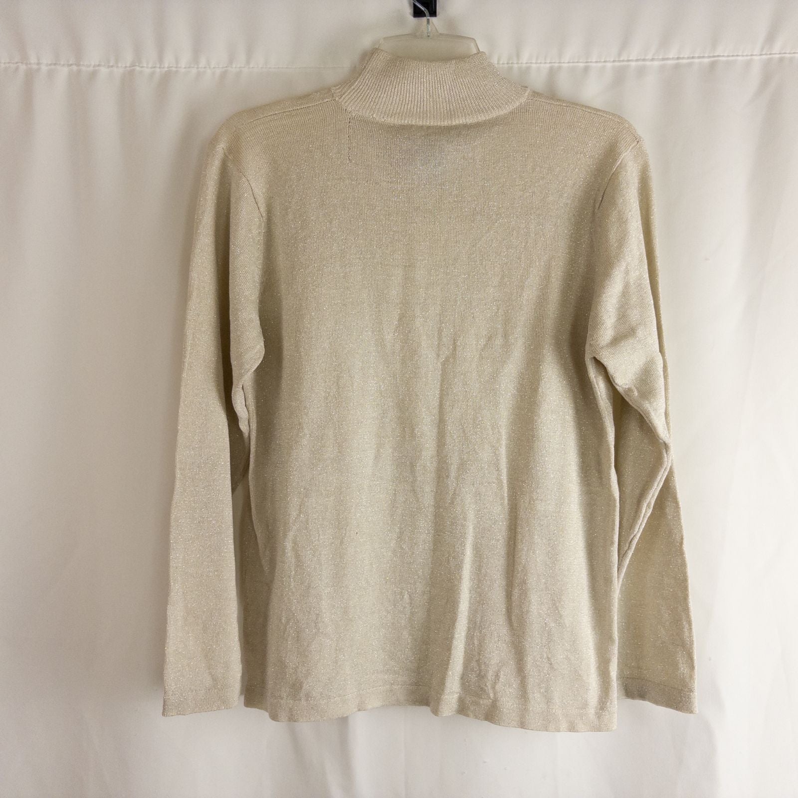 Silver knit long sleeve August Silk sweater with mock neckline laid flat showing subtle shimmer and texture image 6
