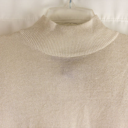 Silver knit long sleeve August Silk sweater with mock neckline laid flat showing subtle shimmer and texture image 2