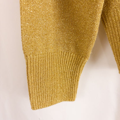 Dress Barn petite gold knit sweater with mock neck and long sleeves hung on a clear hanger image 3