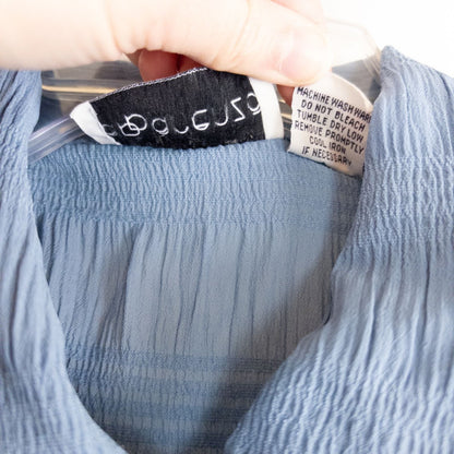 Apparenza vintage pastel blue textured button-up shirt with pointed collar and short sleeves hanging on hanger image 7