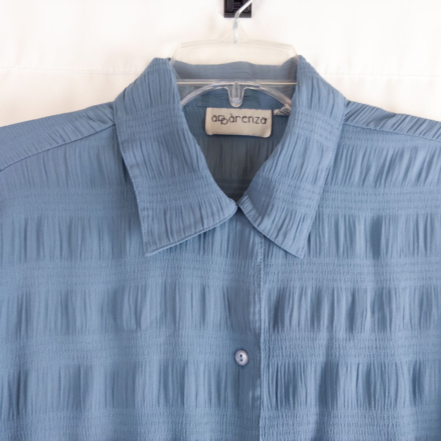 Apparenza vintage pastel blue textured button-up shirt with pointed collar and short sleeves hanging on hanger image 2