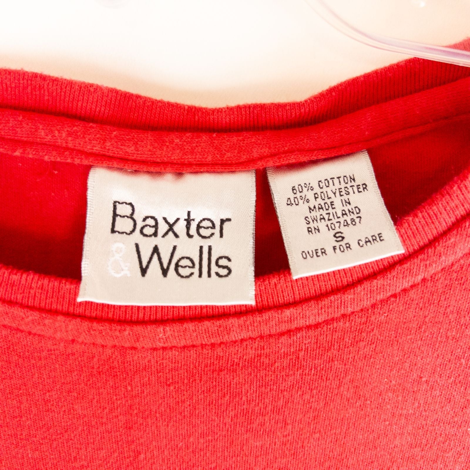 Baxter & Wells vintage red short sleeve t shirt with embroidered logo on chest hanging on clear hanger image 6