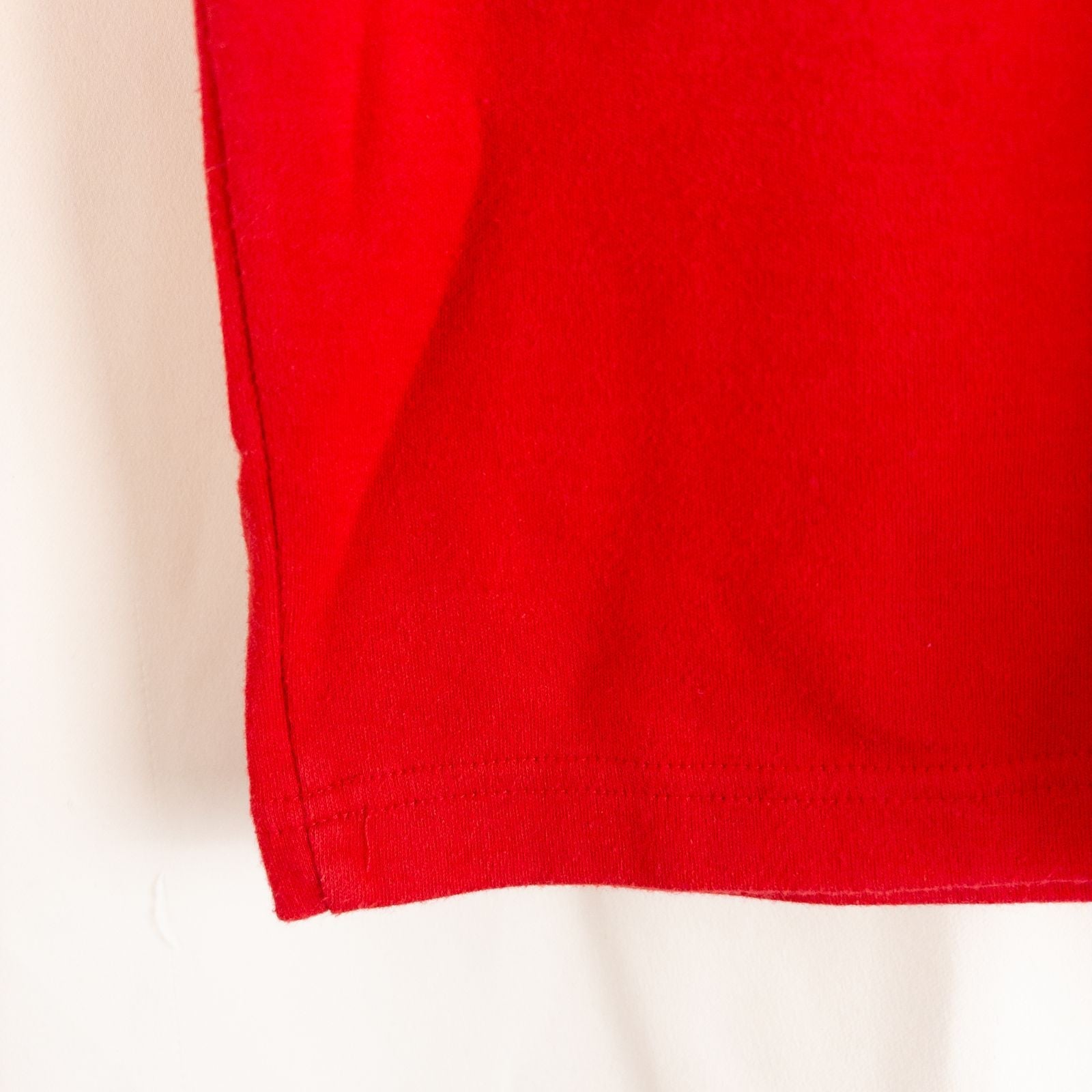 Baxter & Wells vintage red short sleeve t shirt with embroidered logo on chest hanging on clear hanger image 4