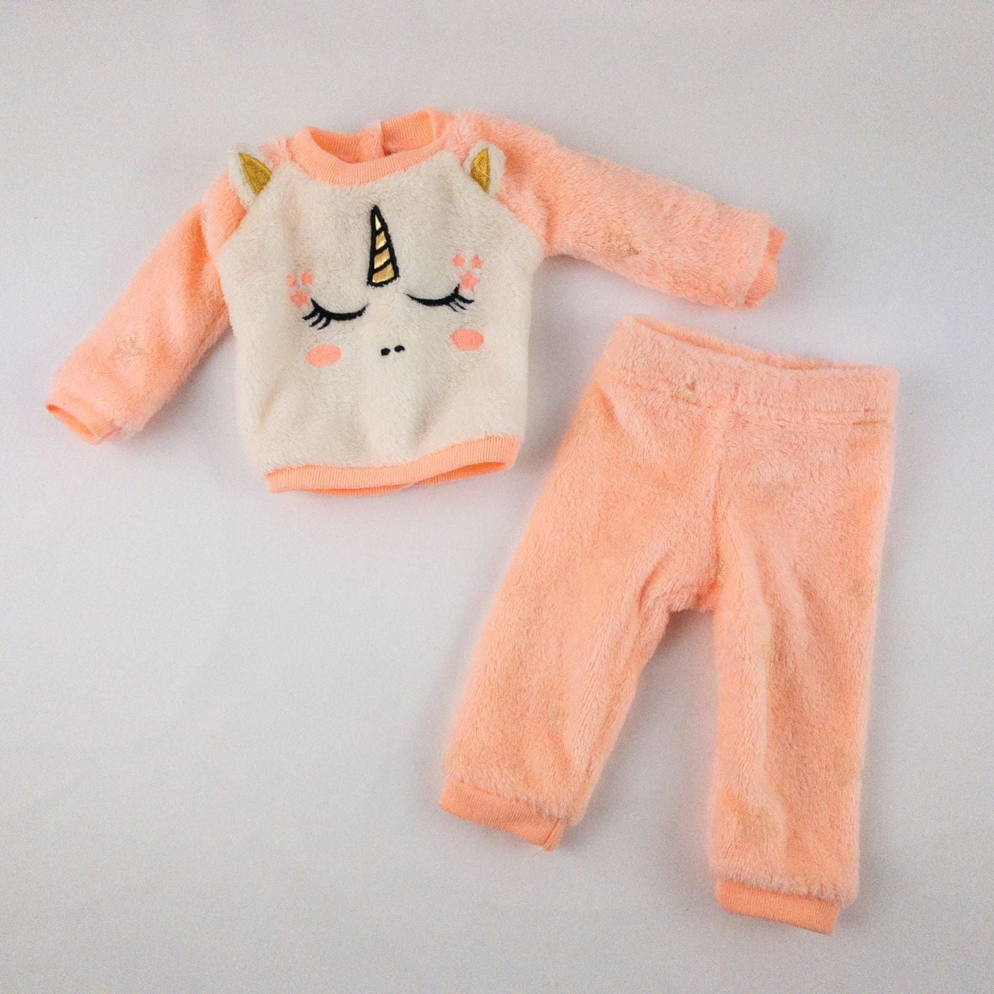 Members Mark pink and white fleece unicorn doll outfit including top with unicorn face and matching pink pants