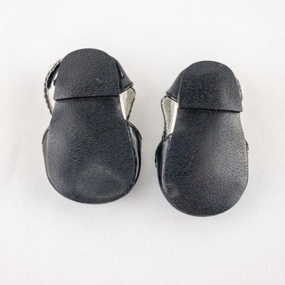 Pair of American Girl Joyful Jewels black doll shoes with rhinestone detail, viewed from front, side, and bottom angles. image 3