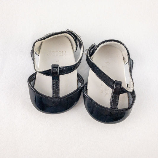 Pair of American Girl Joyful Jewels black doll shoes with rhinestone detail, viewed from front, side, and bottom angles.