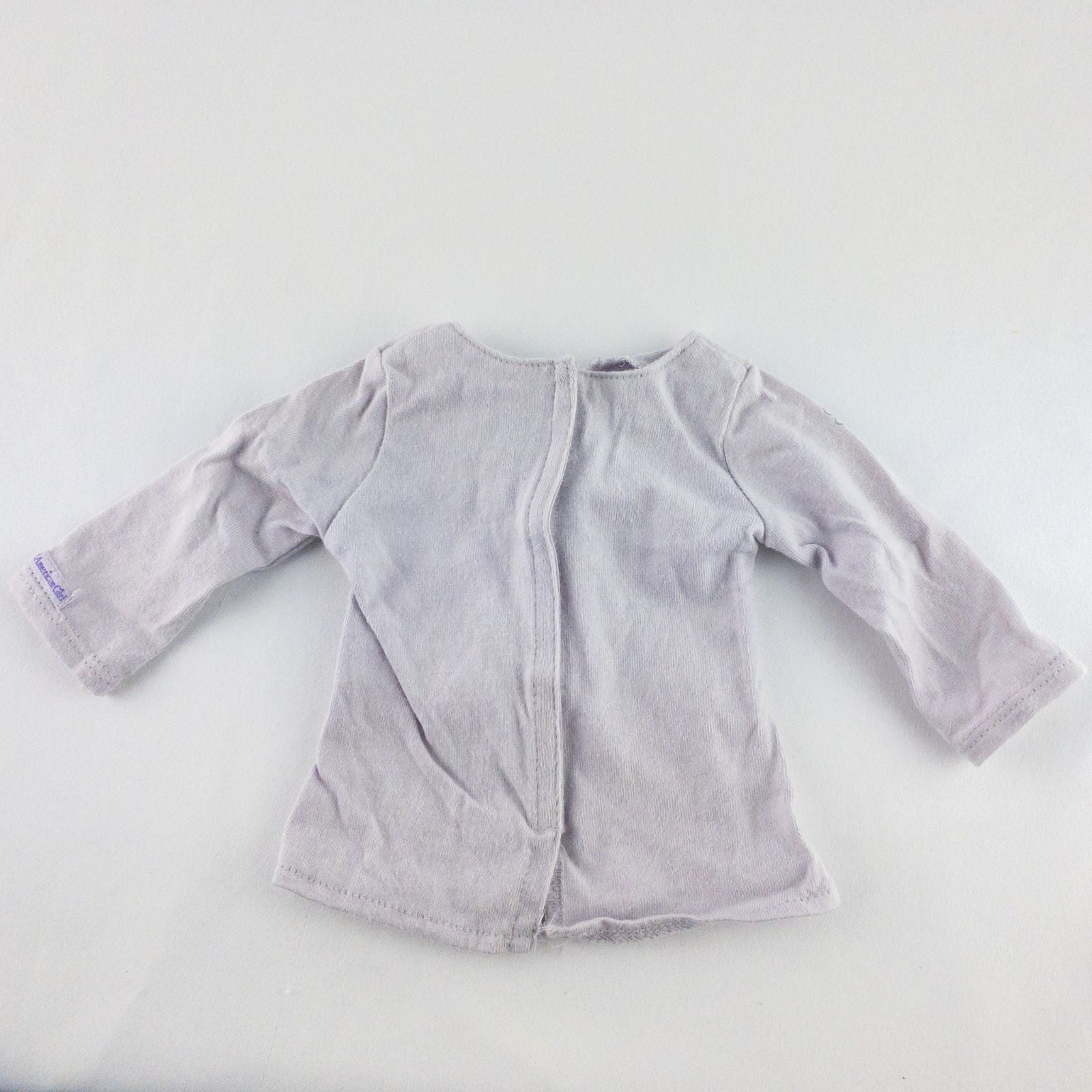 American Girl purple charmed top, matching pants, purple shoes, underwear, and charm necklace doll outfit laid flat image 3