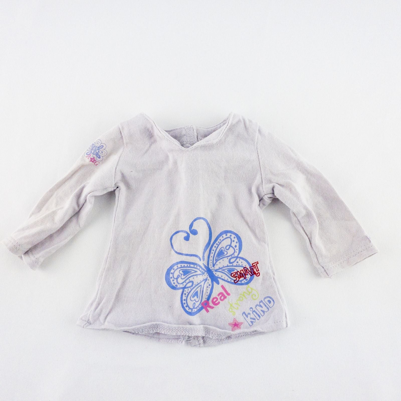 American Girl purple charmed top, matching pants, purple shoes, underwear, and charm necklace doll outfit laid flat image 2