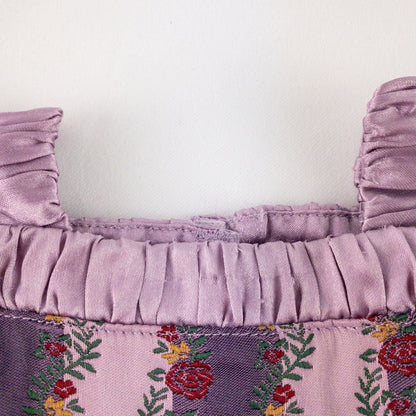 American Girl purple floral gown dress set with satin belt, white gloves, and matching shoes laid flat image 4