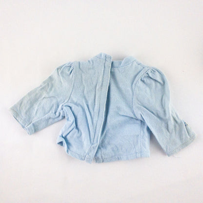 American Girl doll jumper dress outfit with blue corduroy jumper dress, faded light blue long sleeve top, and blue doll boots laid flat on white background image 10
