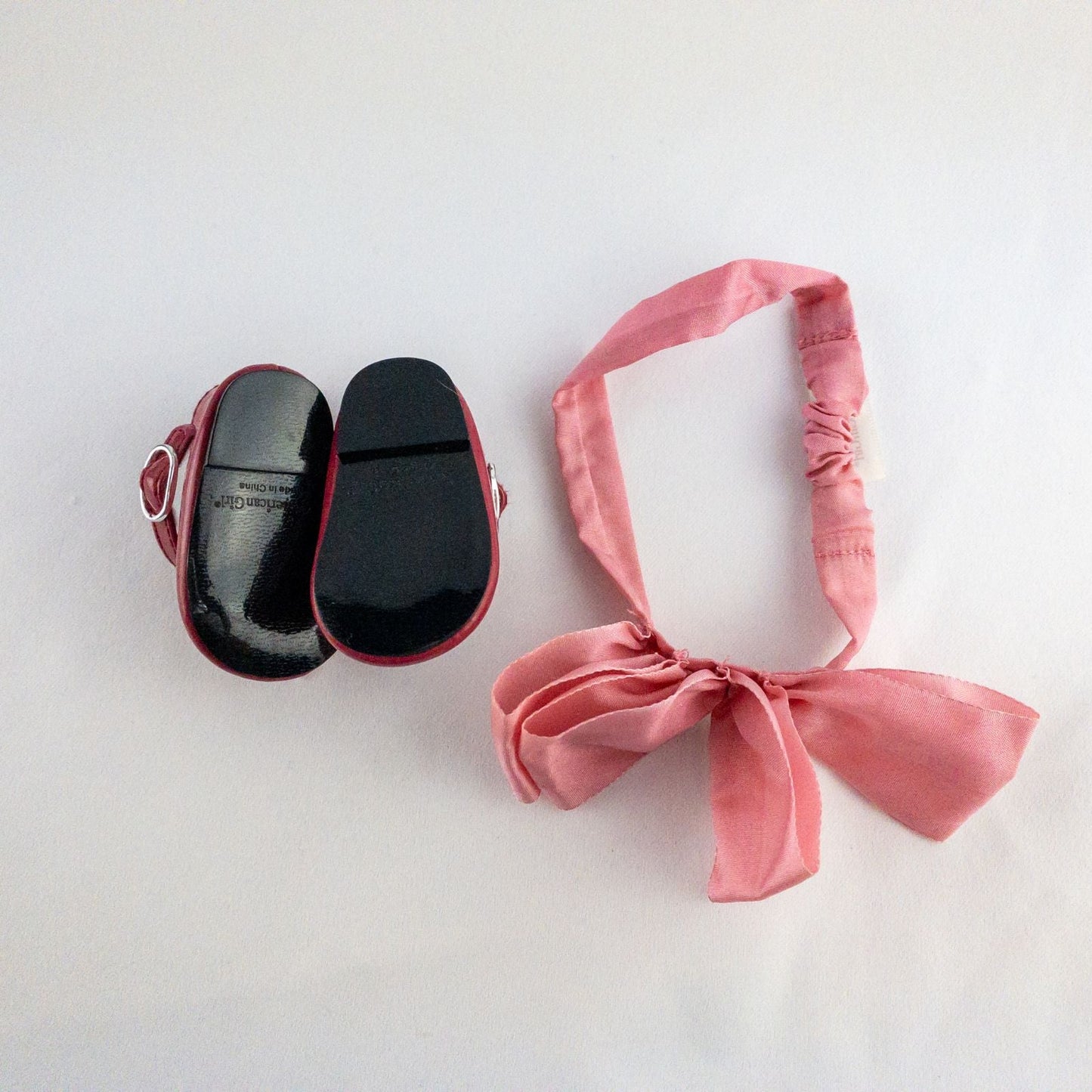 American Girl doll dress set including green floral doll dress with lace trim and pink bow sash, pink bow headband, white stockings, and red patent shoes image 14