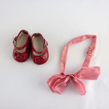 American Girl doll dress set including green floral doll dress with lace trim and pink bow sash, pink bow headband, white stockings, and red patent shoes image 11