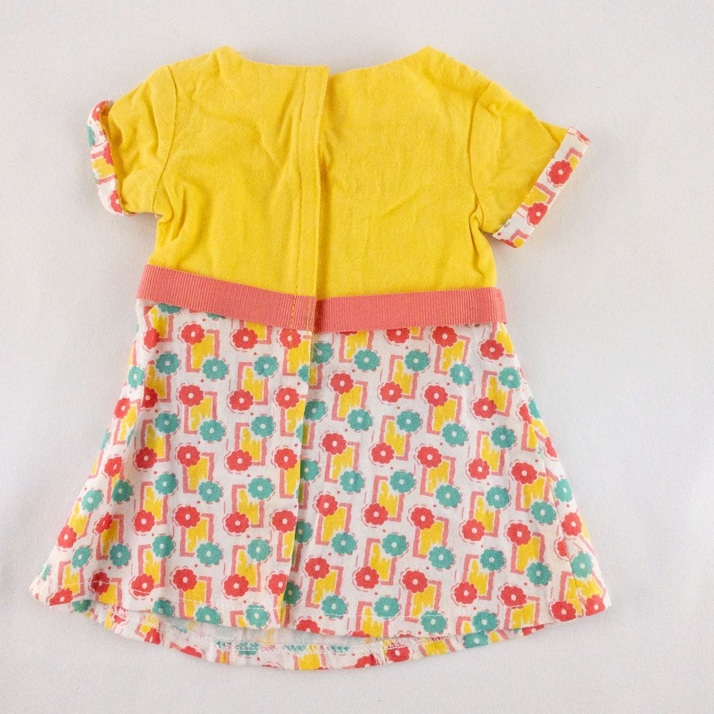 American Girl Kit doll outfit set with yellow floral dress, coral knit cardigan with flower buttons, and yellow shoes with coral bows image 4