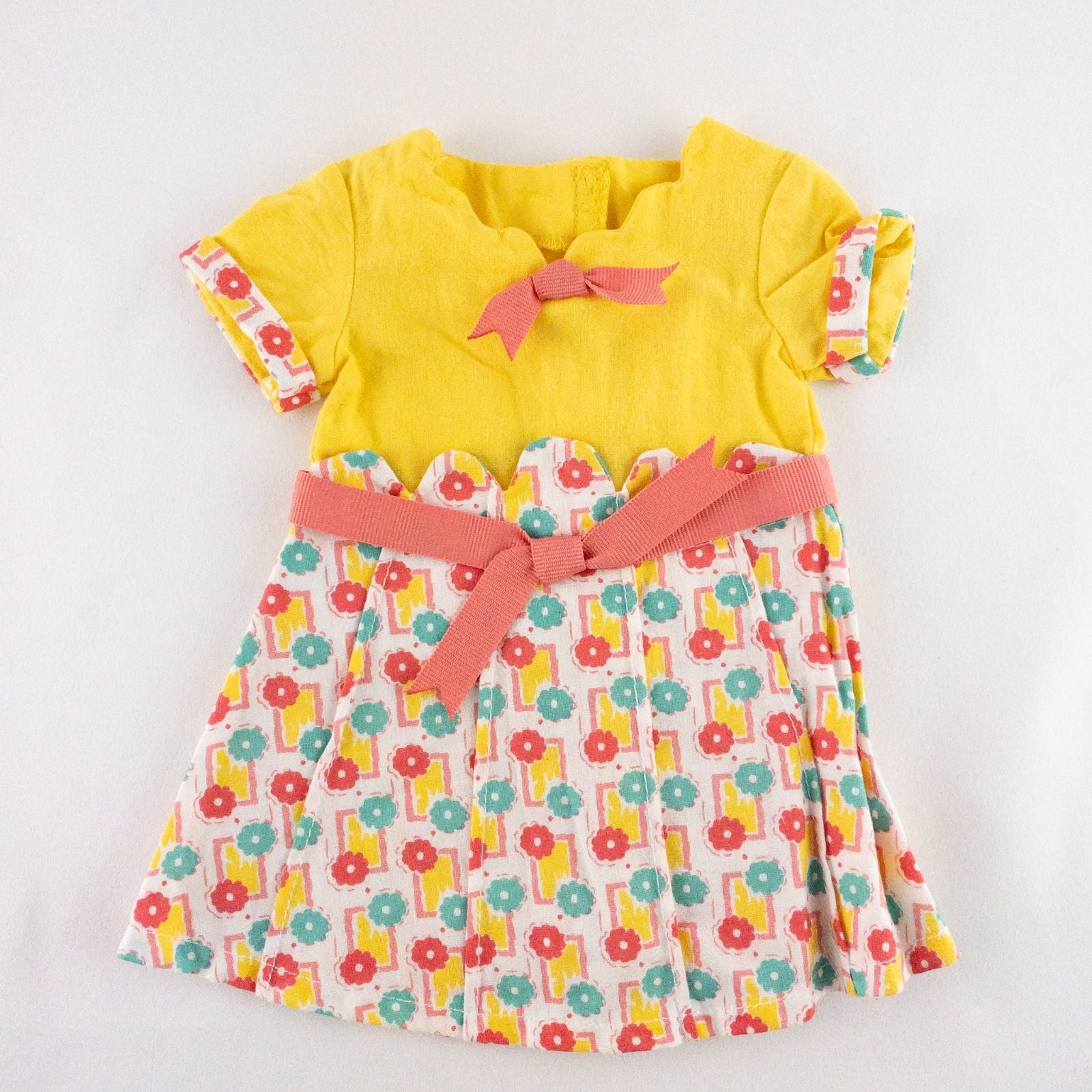 American Girl Kit doll outfit set with yellow floral dress, coral knit cardigan with flower buttons, and yellow shoes with coral bows image 2
