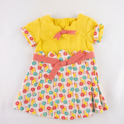 American Girl Kit doll outfit set with yellow floral dress, coral knit cardigan with flower buttons, and yellow shoes with coral bows image 2
