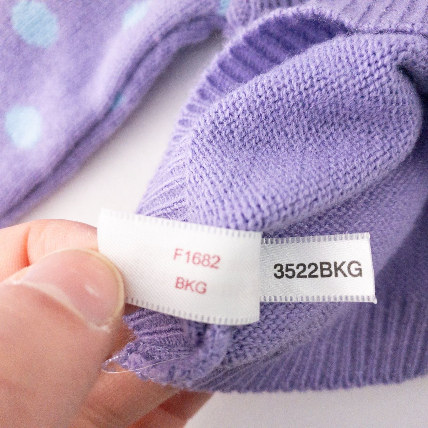 American Girl doll outfit with purple polka dot hoodie, blue pants, and magenta hat laid flat with visible light marks image 9