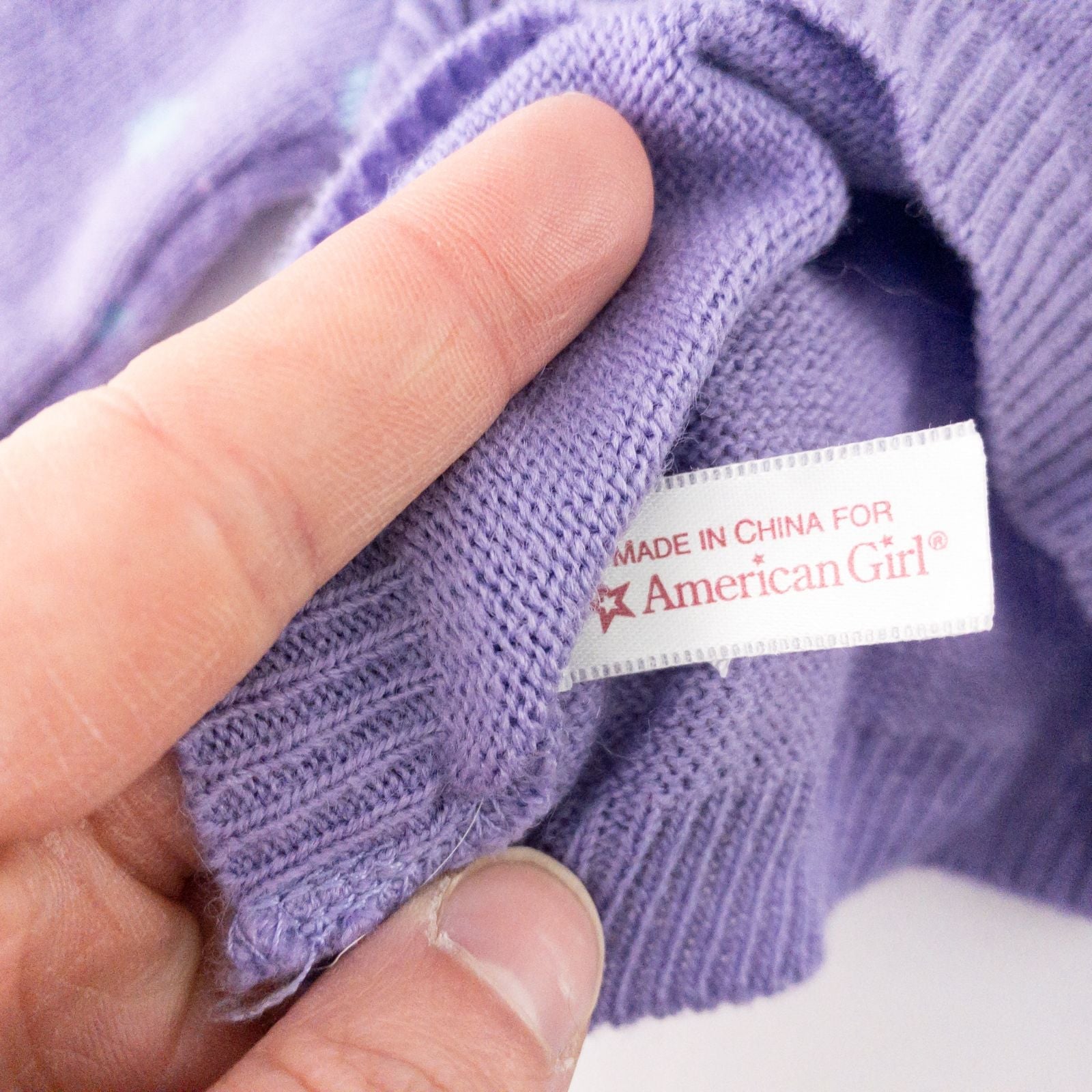 American Girl doll outfit with purple polka dot hoodie, blue pants, and magenta hat laid flat with visible light marks image 8