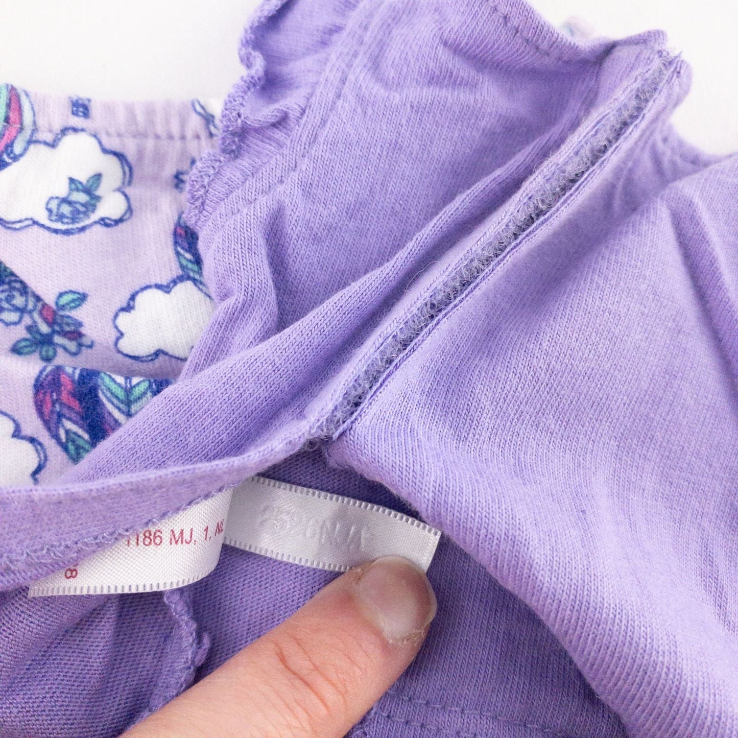 American Girl doll outfit featuring purple sleeveless top with hot air balloon print, matching pajama bottoms with hot air balloons, and pink fuzzy slippers image 7