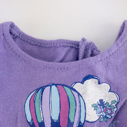 American Girl doll outfit featuring purple sleeveless top with hot air balloon print, matching pajama bottoms with hot air balloons, and pink fuzzy slippers image 3