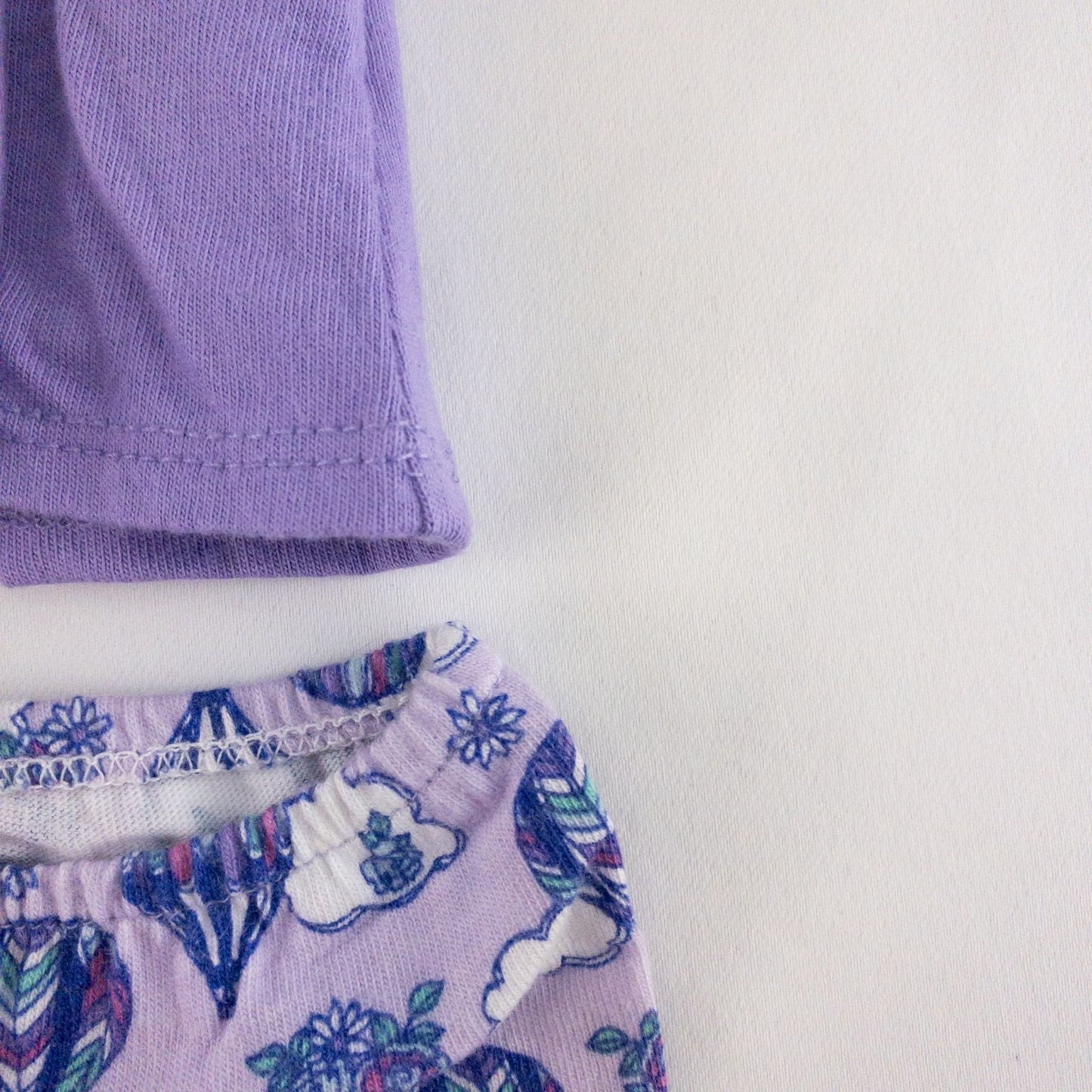 American Girl doll outfit featuring purple sleeveless top with hot air balloon print, matching pajama bottoms with hot air balloons, and pink fuzzy slippers image 4