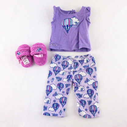 American Girl doll outfit featuring purple sleeveless top with hot air balloon print, matching pajama bottoms with hot air balloons, and pink fuzzy slippers image 9