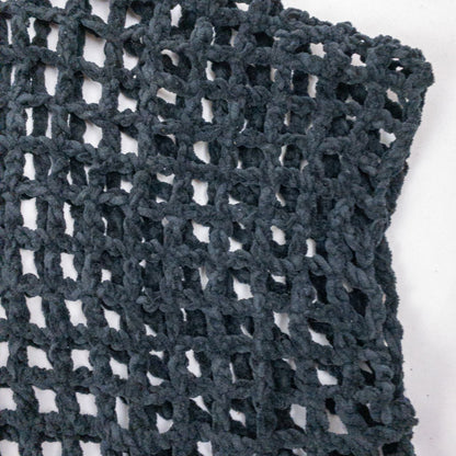 Carla Fernandez black fishnet knit rope sweater with short sleeves displayed on a hanger against a white background image 2