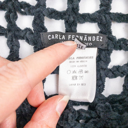 Carla Fernandez black fishnet knit rope sweater with short sleeves displayed on a hanger against a white background image 11
